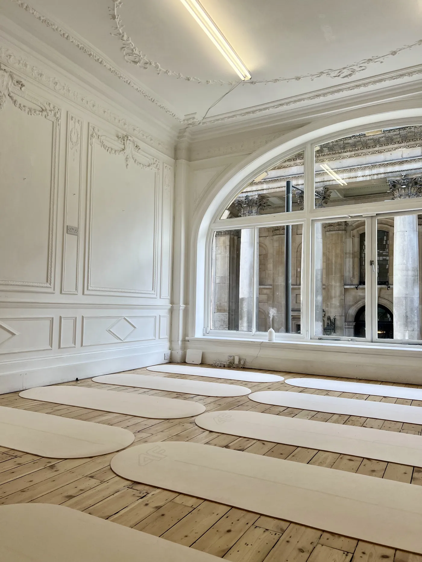 Luxury lifestyle detail — pink peonies on marble